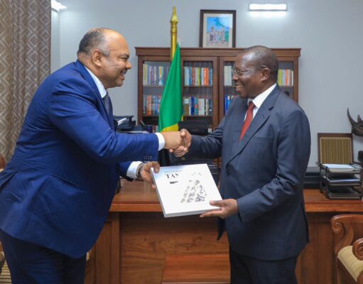 DK. MPANGO AKABIDHIWA KITABU CHA SAFARI YA MIAKA 60 YA MUUNGANO